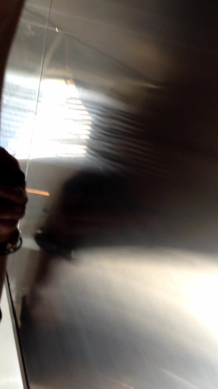 Upskirt thighs and ass closeup on escalator.MOV