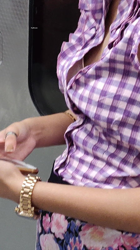 Young lady designer bra visible clearly through open shirt