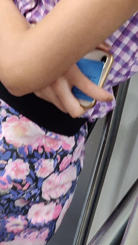 Young lady designer bra visible clearly through open shirt