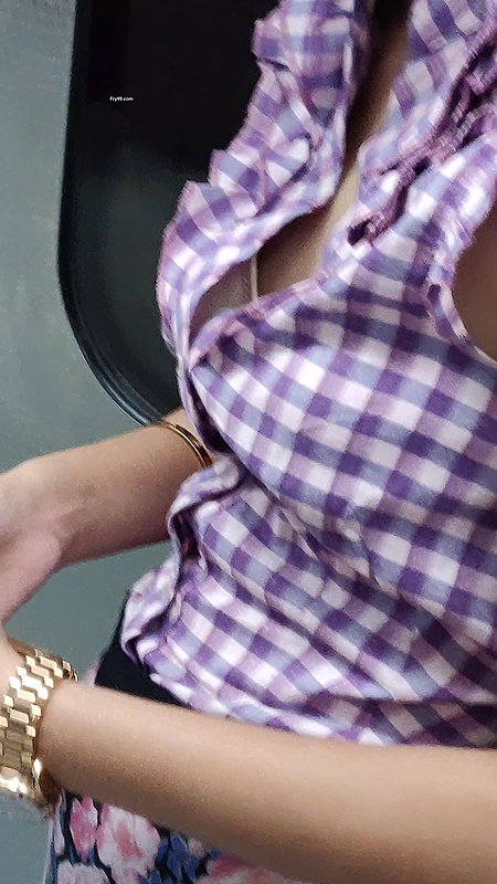 Young lady designer bra visible clearly through open shirt