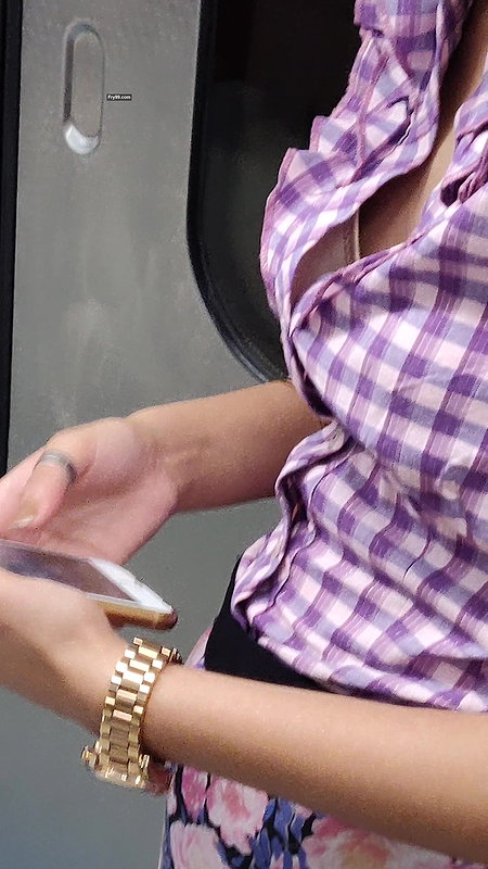 Young lady designer bra visible clearly through open shirt