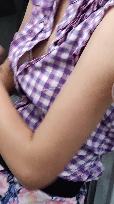 Young lady designer bra visible clearly through open shirt