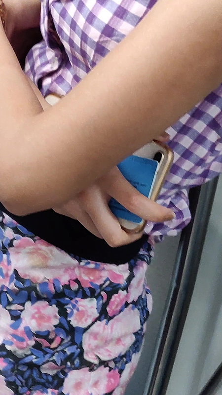 Young lady designer bra visible clearly through open shirt