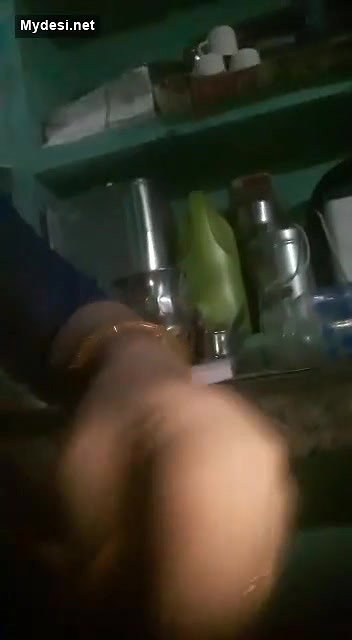 Sexy aunty showing at kitchen