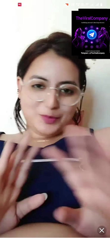 Butterscotch Non Nude Showing her figure, cleavage and pressing her boobs