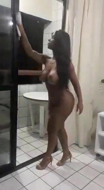 Black girl cleaning her house