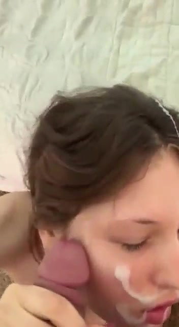 Cute girl gets cum on her face