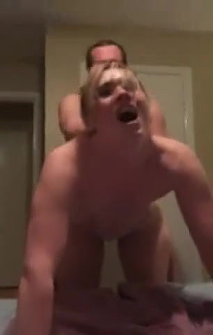 He gives her anal while talking to her husband