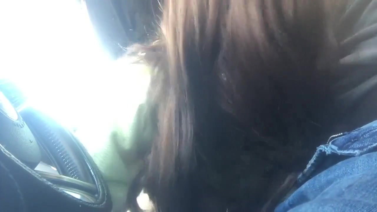 She gags on black cock while sucking him in the car and tastes the cum
