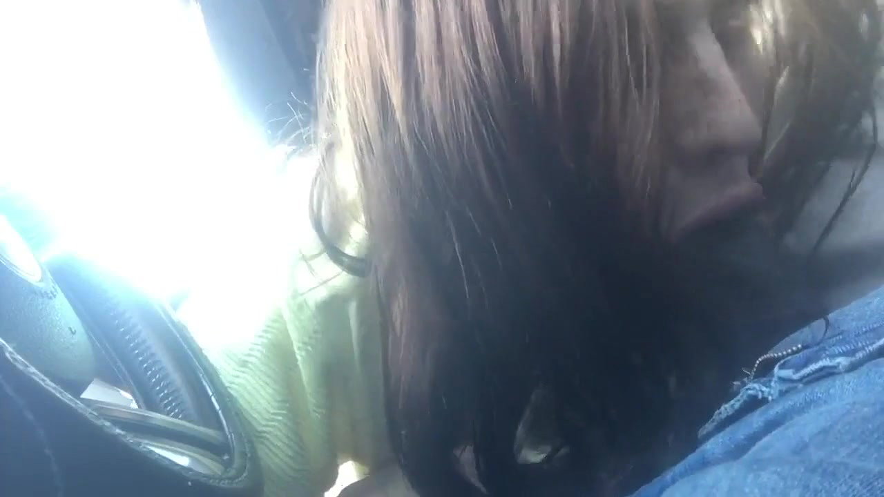 She gags on black cock while sucking him in the car and tastes the cum