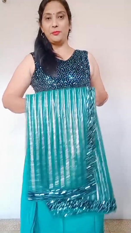 kruti Patel with net saree drapping with waist cha.