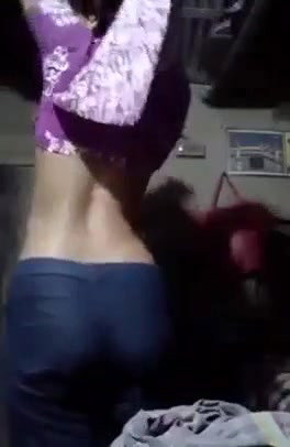 Village girl removing her kamiz