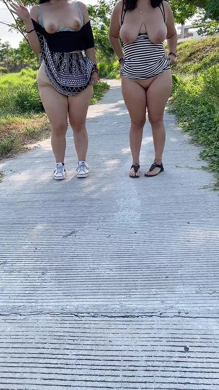 Small uncut penis using a urinal in a public restroom_513d2341