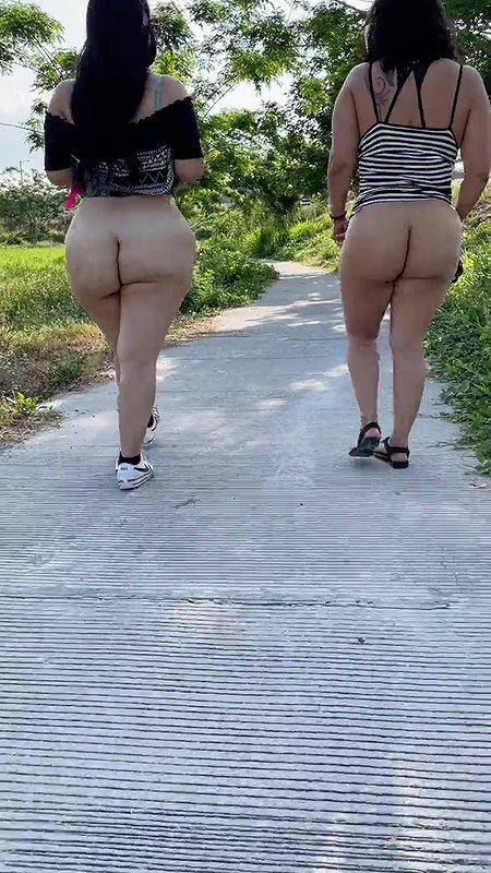 Small uncut penis using a urinal in a public restroom_513d2341