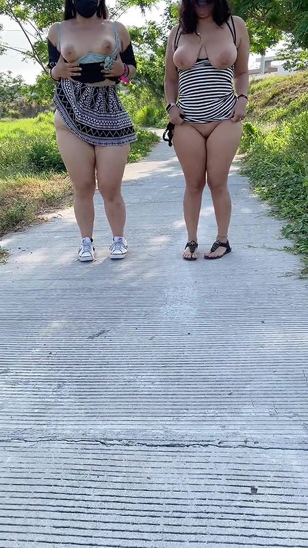 Small uncut penis using a urinal in a public restroom_513d2341