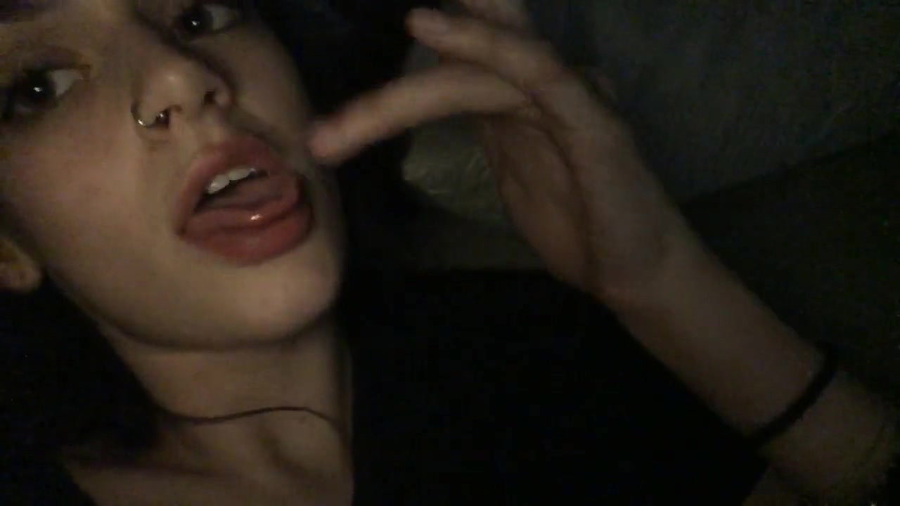 Cute horny teen licks her cum off her fingers on cam