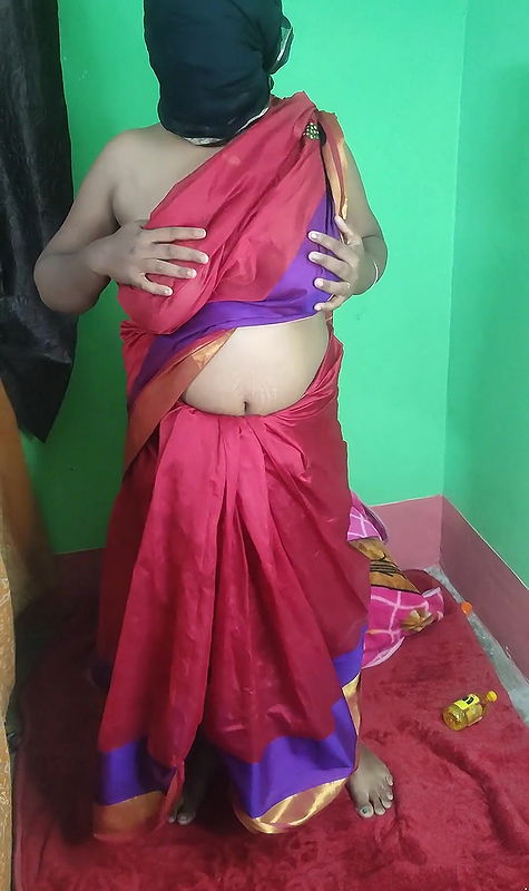 Desi Bengali boudi Strips in sharee and fucking with cucumber.