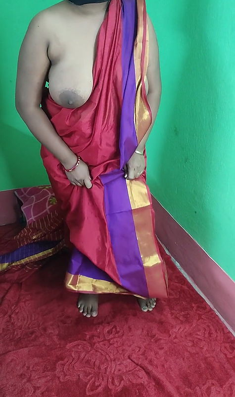 Desi hot aunty Strips in red sharee and fingering with three fingers.