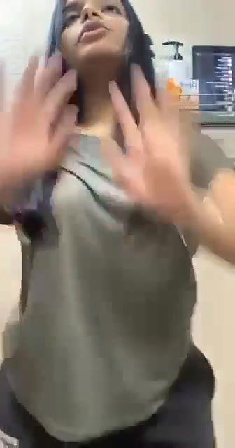 Sexy tanker babe in bathroom