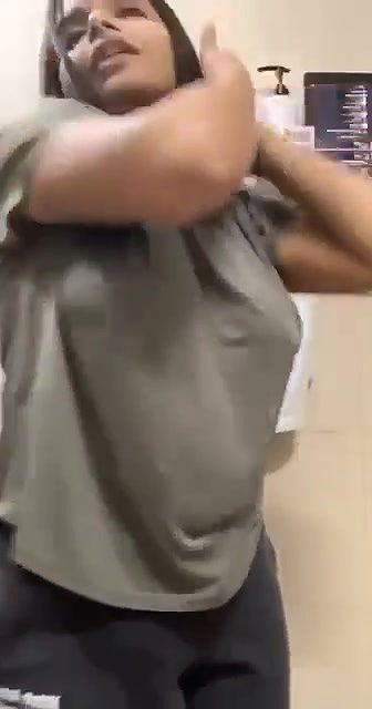 Sexy tanker babe in bathroom