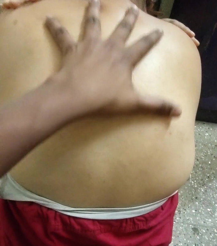 Auntie’s back massaged by her boyfriend.