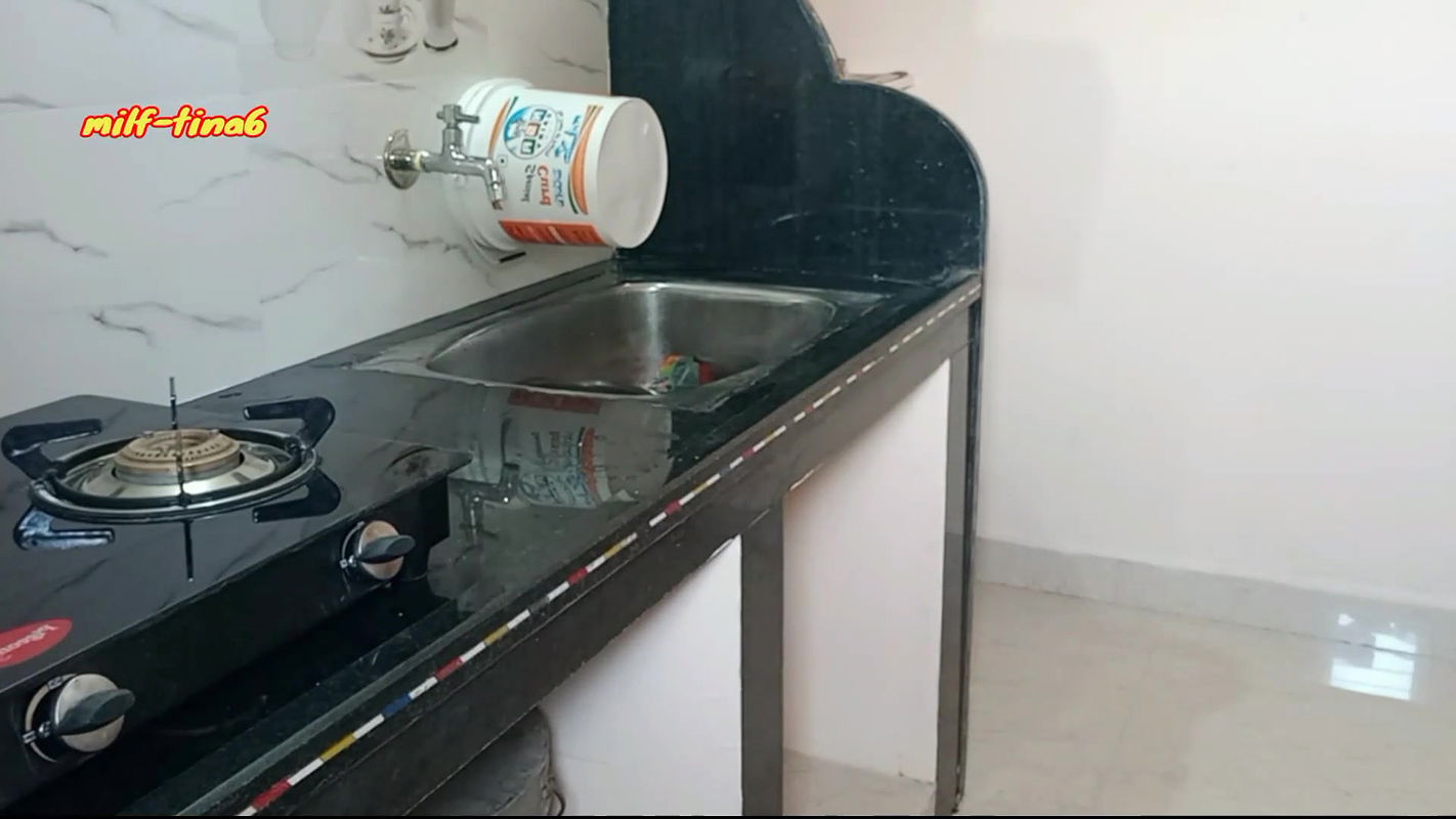 Desi couple homemade hardcore doggystyle pussy fucking in kitchen.