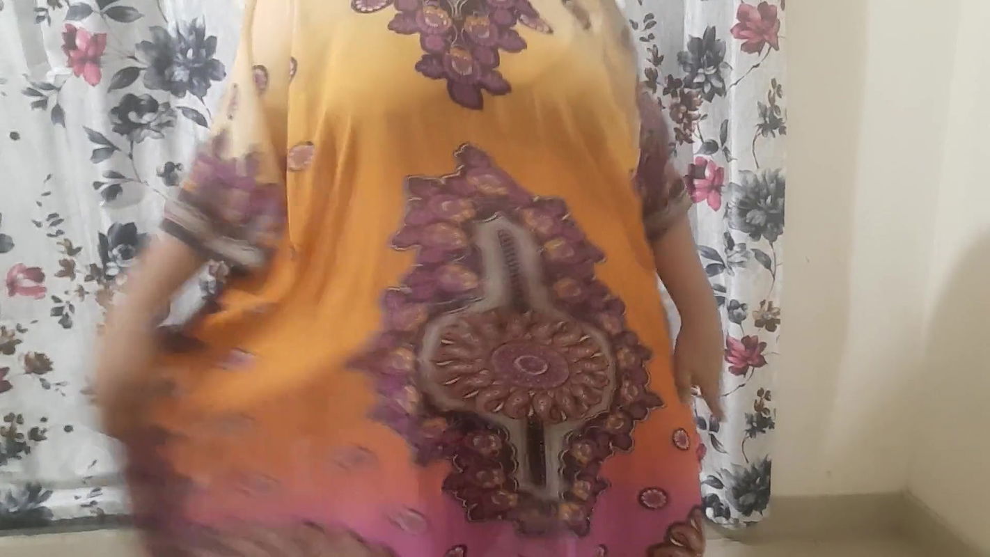 Desi Hot Bhabhi Getting Ready For Beach Wearing A Bikini Under Her Dress.