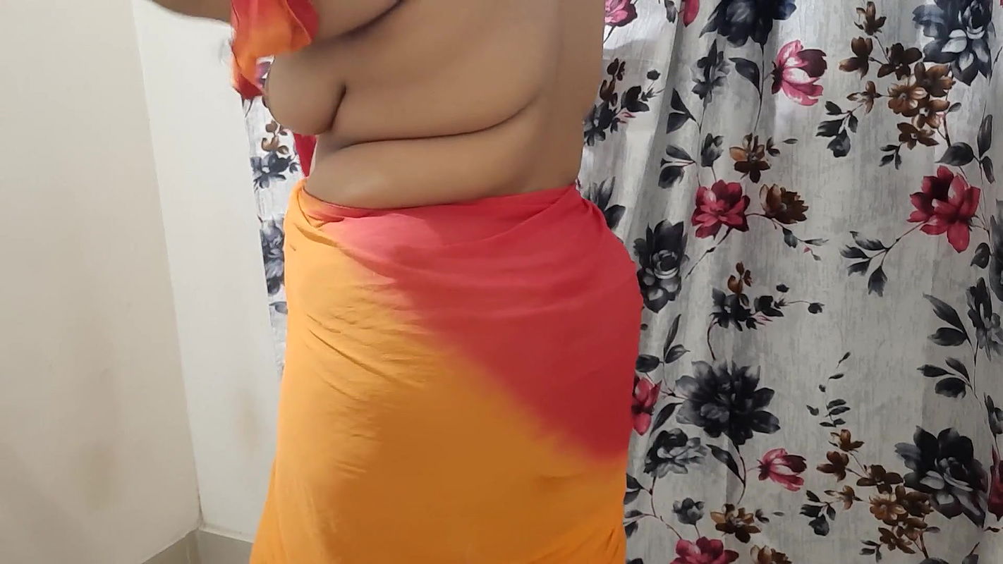 DESI VILLAGE BHABHI CHANGING HER CLOTHES IN BEDROOM WITH CAMERA ON.