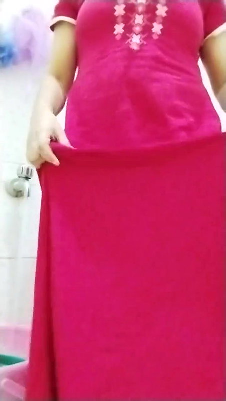 Indian girl pissing, Vaginal discharge and bathing in a video shot by herself.