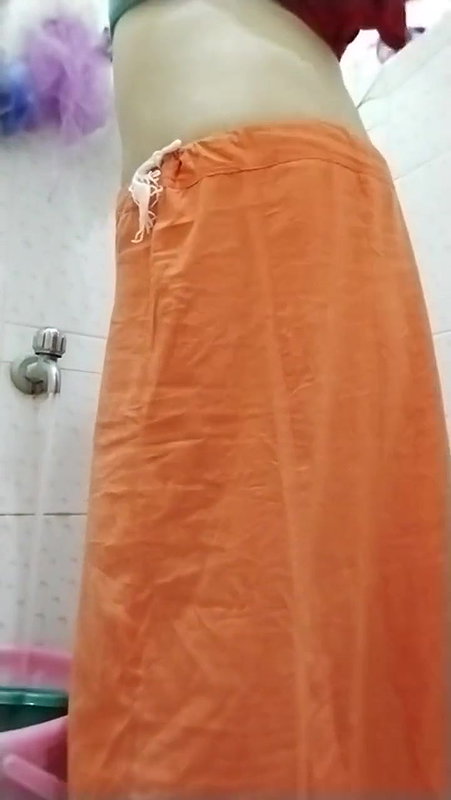 Indian girl pissing, Vaginal discharge and bathing in a video shot by herself.