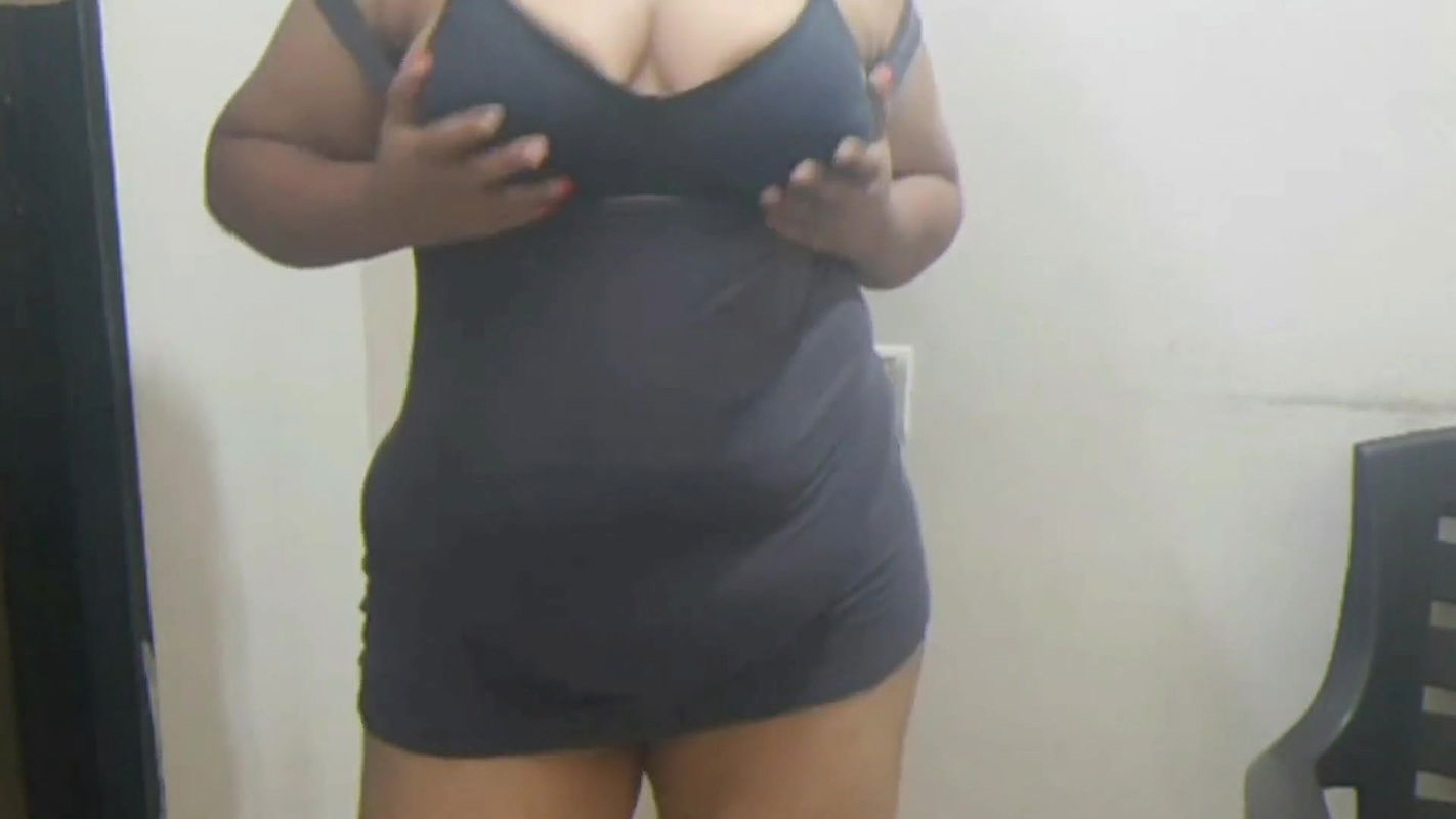 Indian girlfriend teasing her boyfriend with sexy strip show.