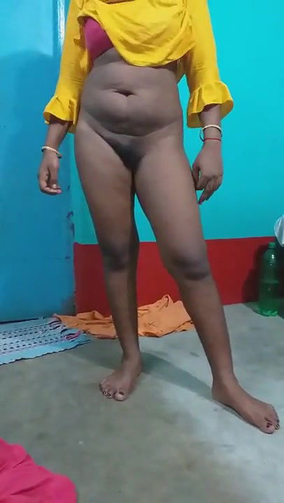 Pampa in a yellow dress.