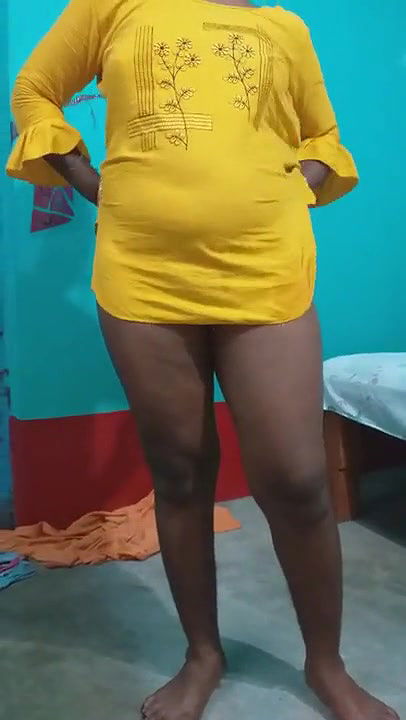 Pampa in a yellow dress.