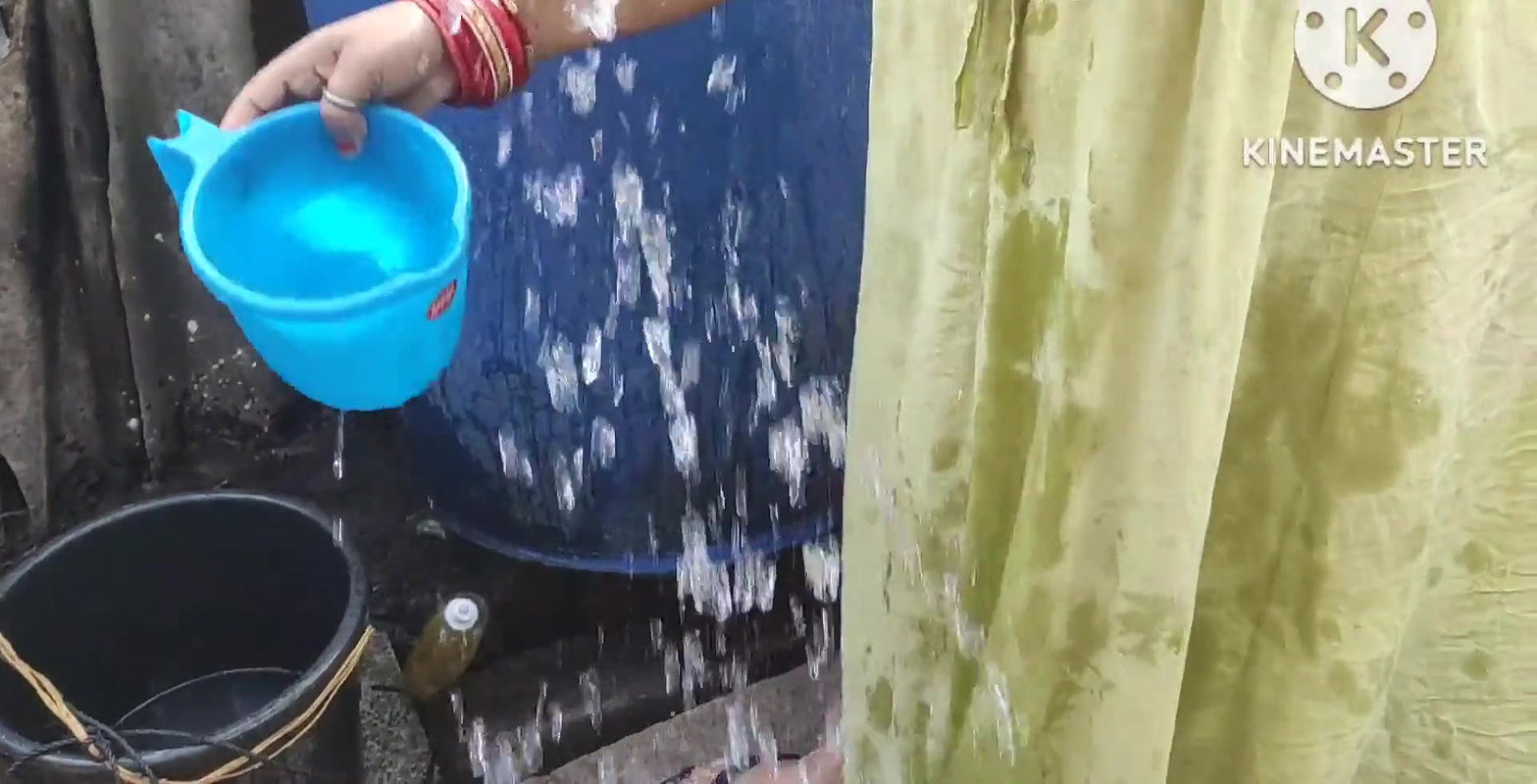 Anita yadav bathing outside with dance. T