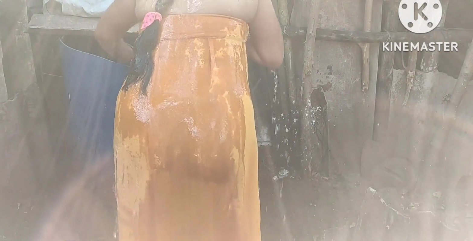 Anita yadav bathing outside with hot.