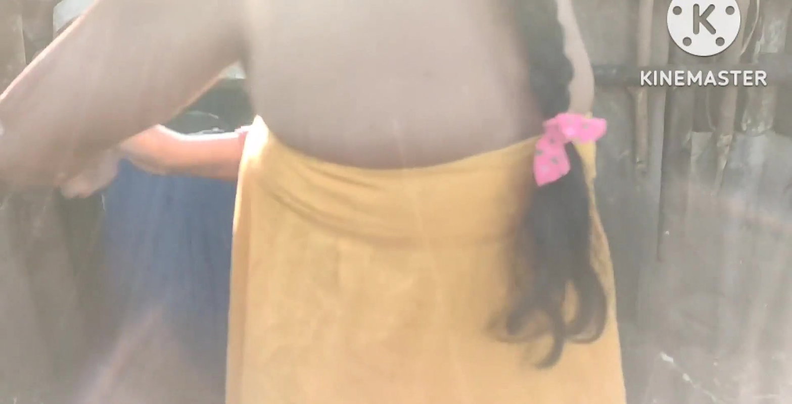 Anita yadav bathing outside with hot.