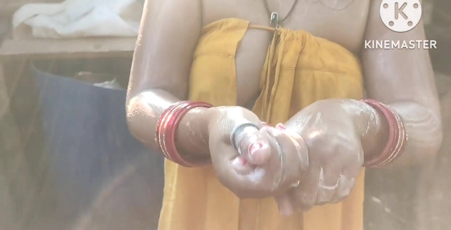 Anita yadav bathing outside with hot.