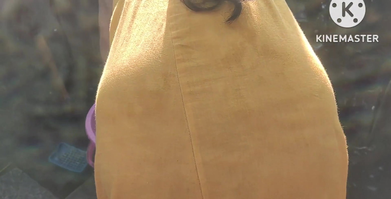 Anita yadav bathing outside with hot.