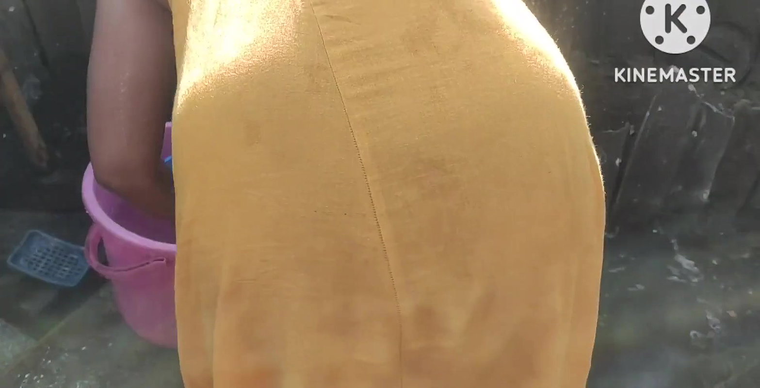 Anita yadav bathing outside with hot.