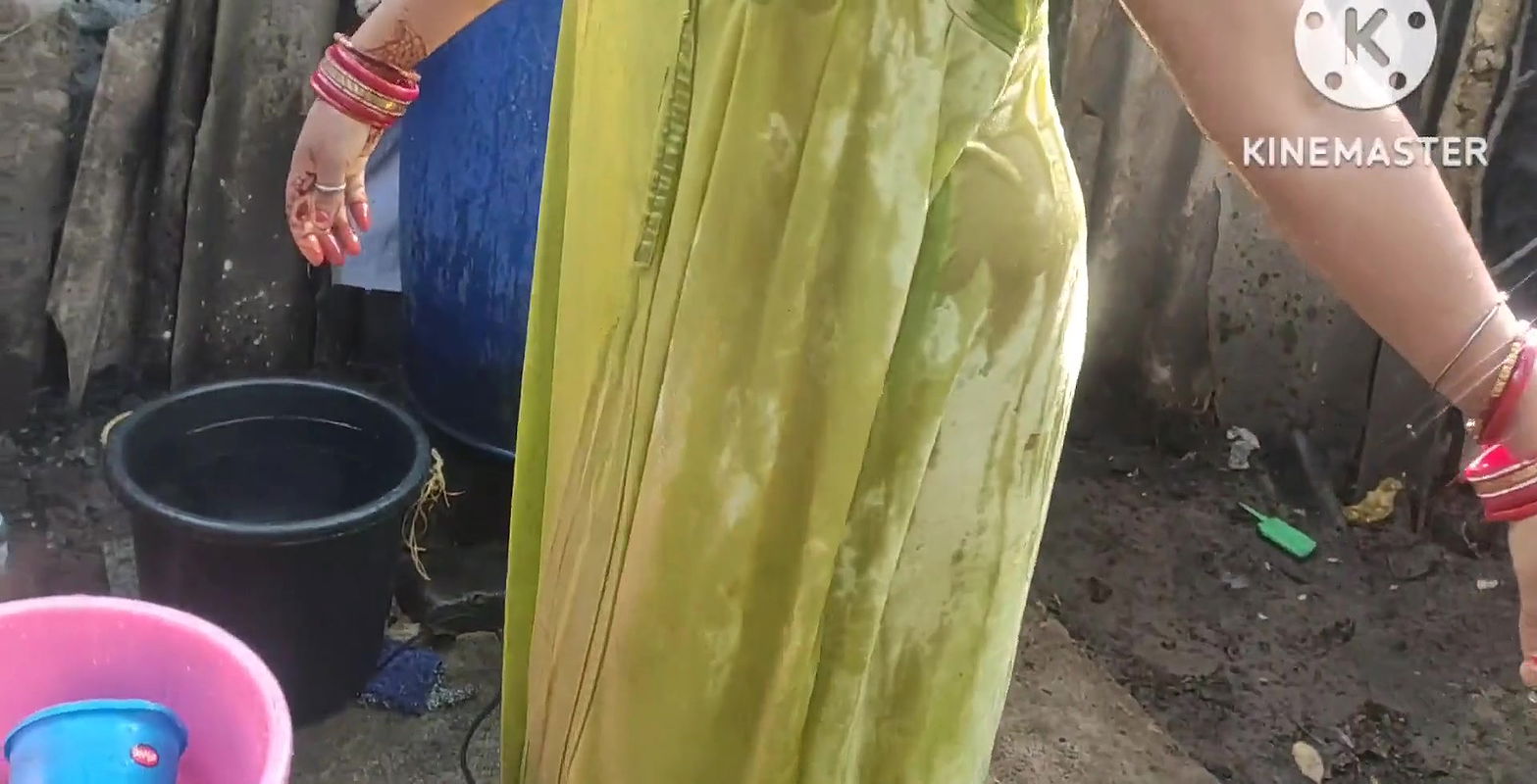 Bathing with cold water topless.