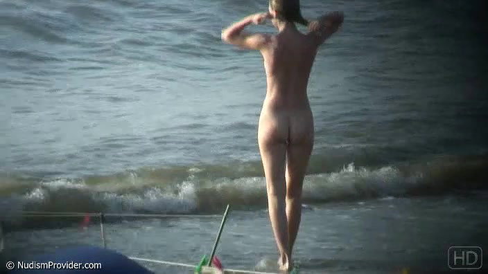 Sweaty Natasha walks naked on the beach_ba4a3b6f
