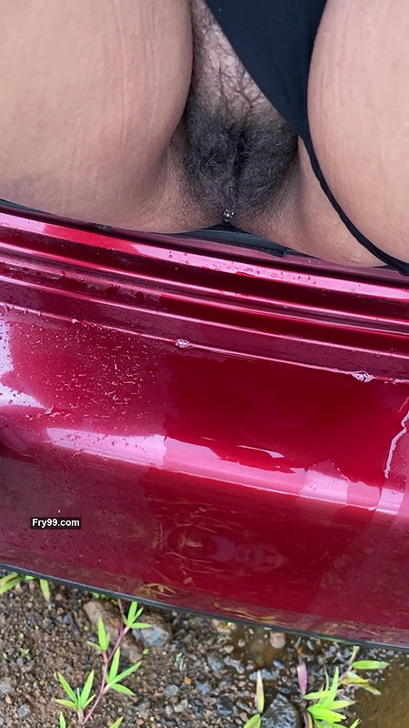 hot girl pissing on the way outside of the car boot.