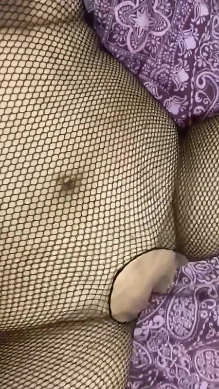 Wildenglishbbw laying in bed in fishnet body suite.