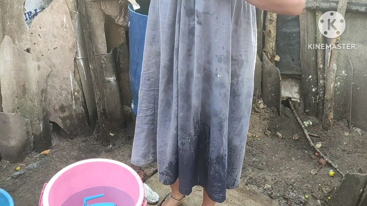 mature likes to pour water on herself with clothes on