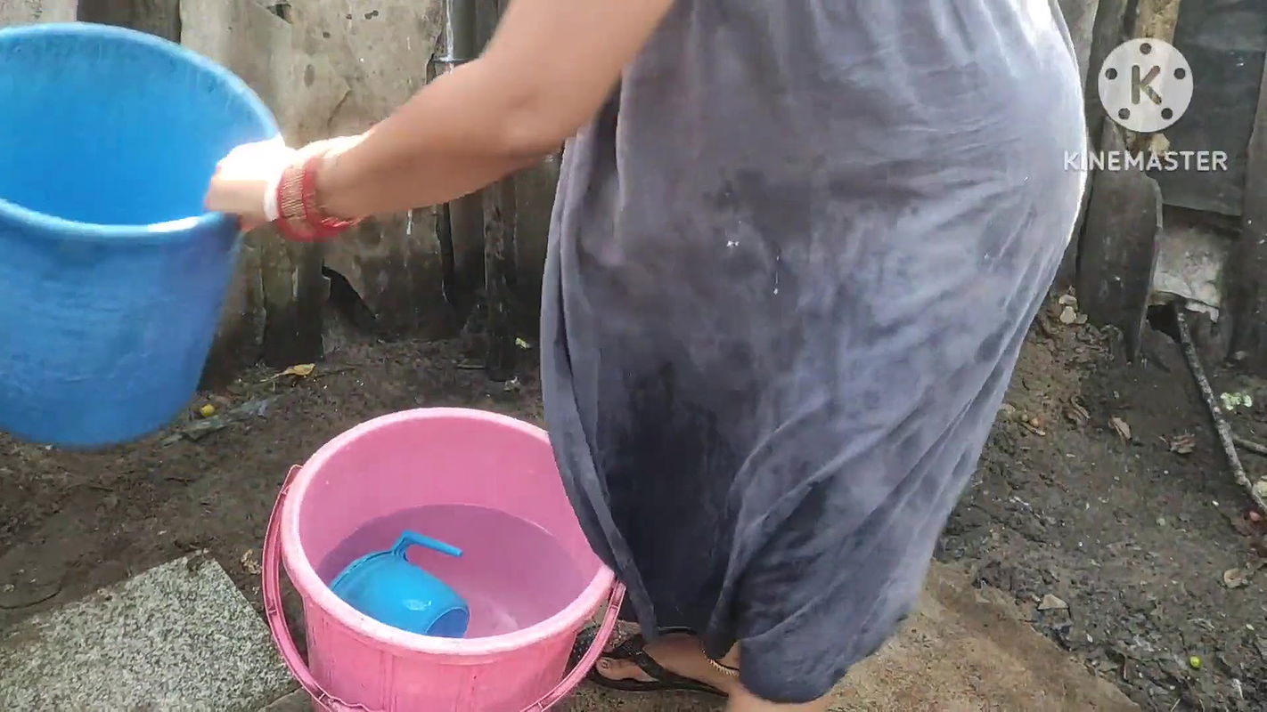 mature likes to pour water on herself with clothes on
