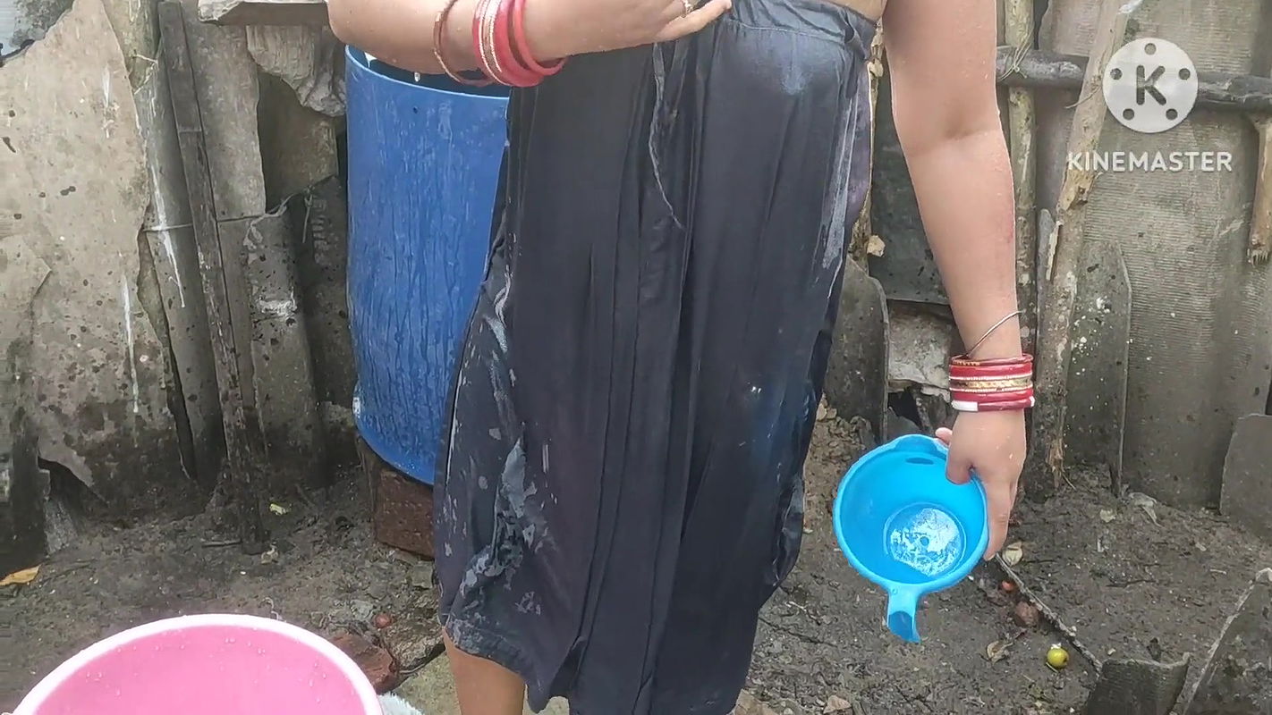 mature likes to pour water on herself with clothes on