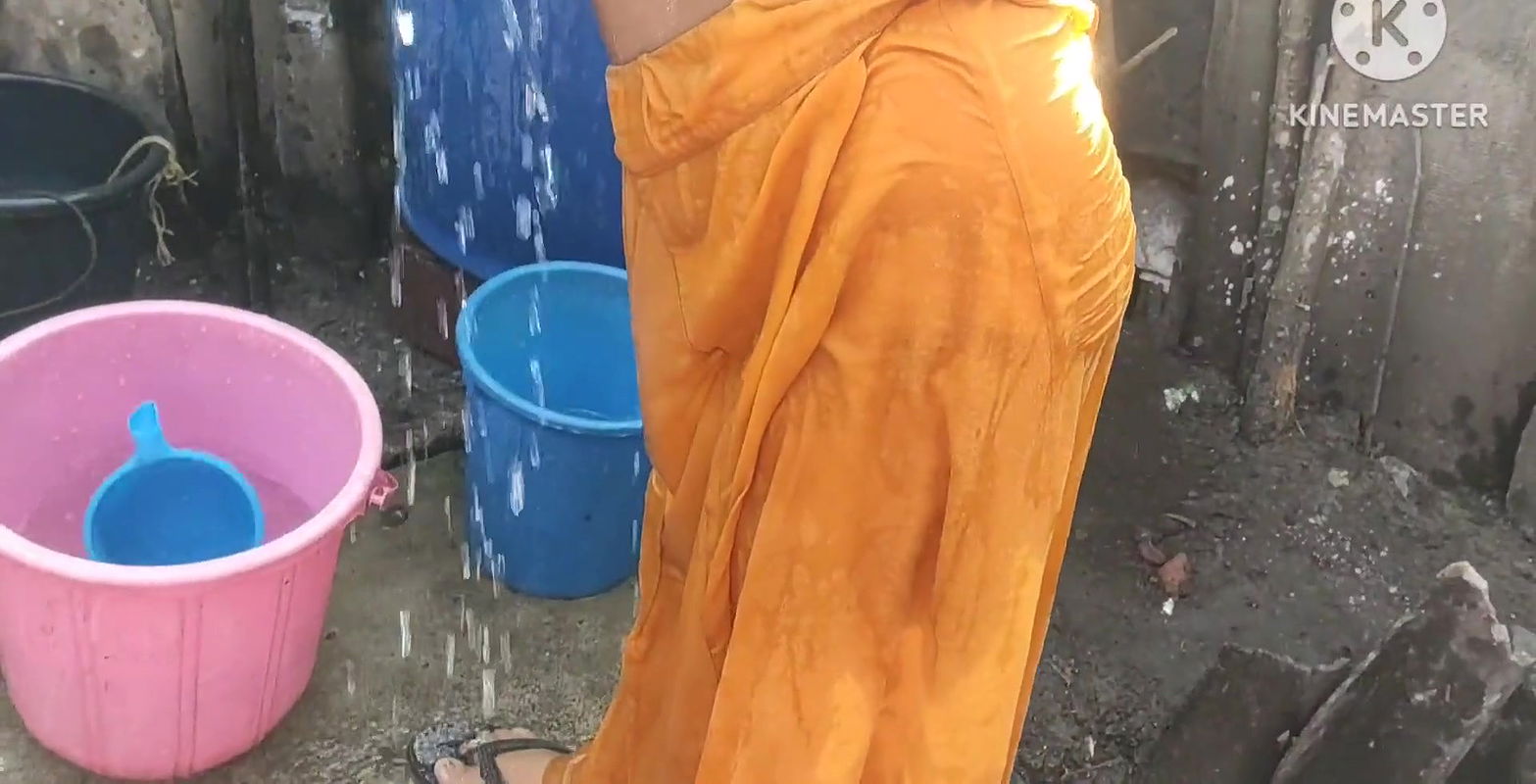 Anita yadav bathing outside with hot