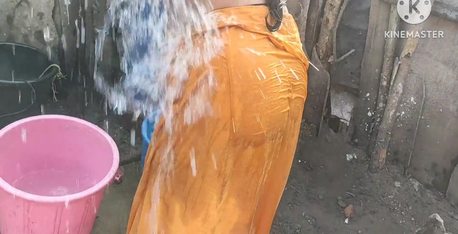 Anita yadav bathing outside with hot