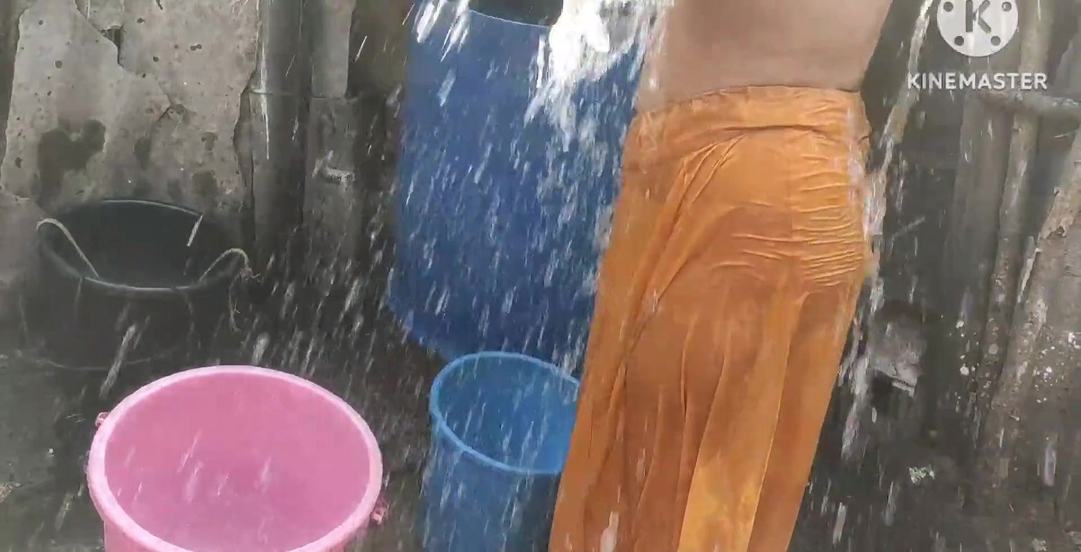 Anita yadav bathing outside with hot