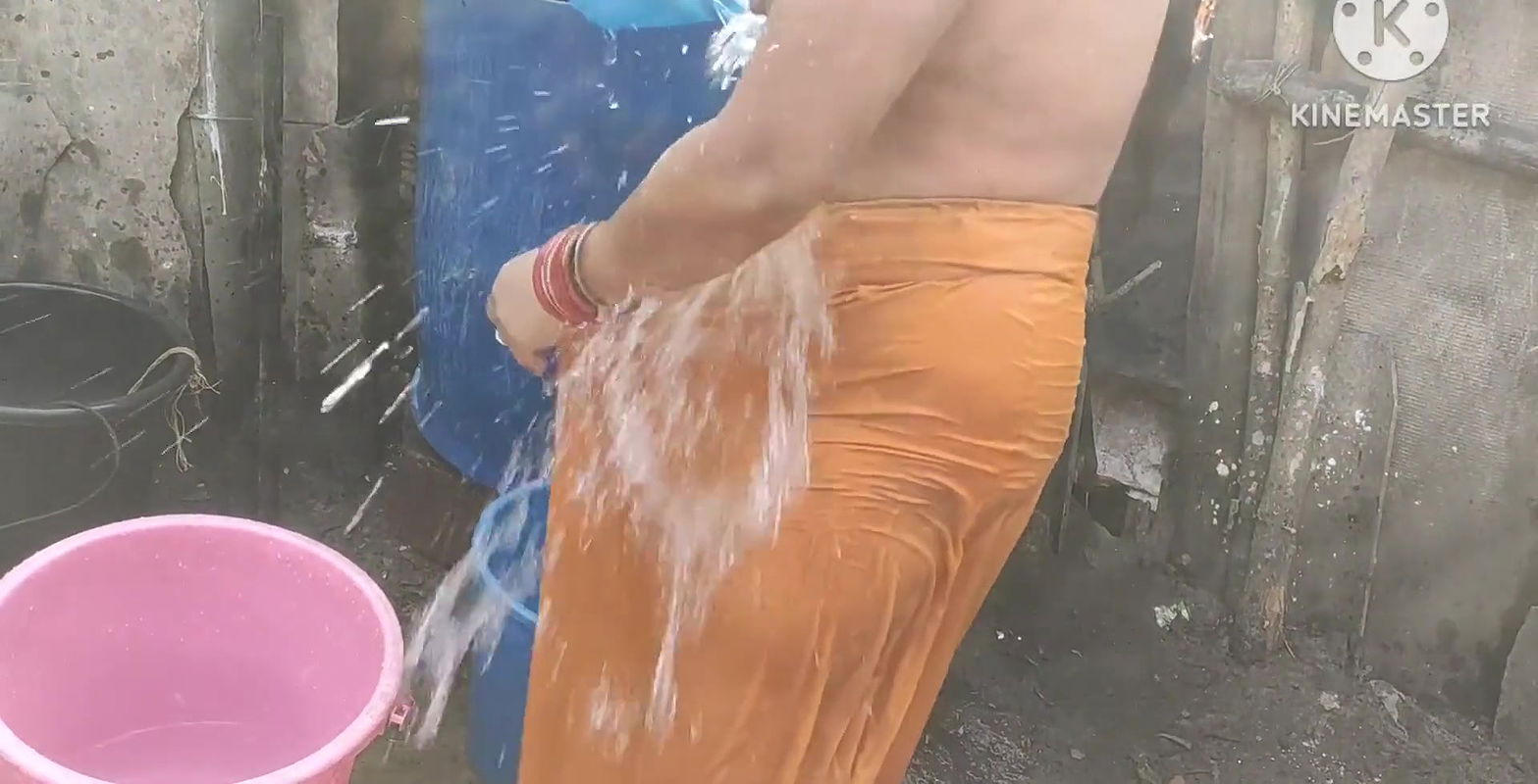 Anita yadav bathing outside with hot